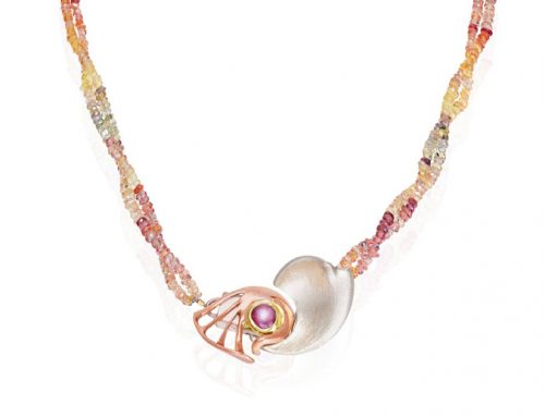 Rose and white gold clasp set with a star sapphire and strung on a corundum necklace NC-G 004-Daniel Gallie