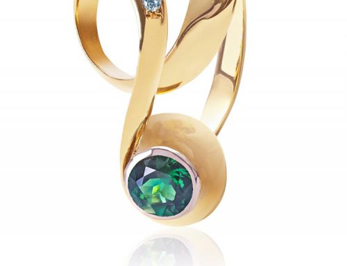 Infinity, flowing gold ring set with a vivid green tourmaline and pave diamonds RI-GD034-Daniel Gallie